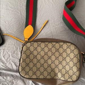A Gucci crossbody bag with strap